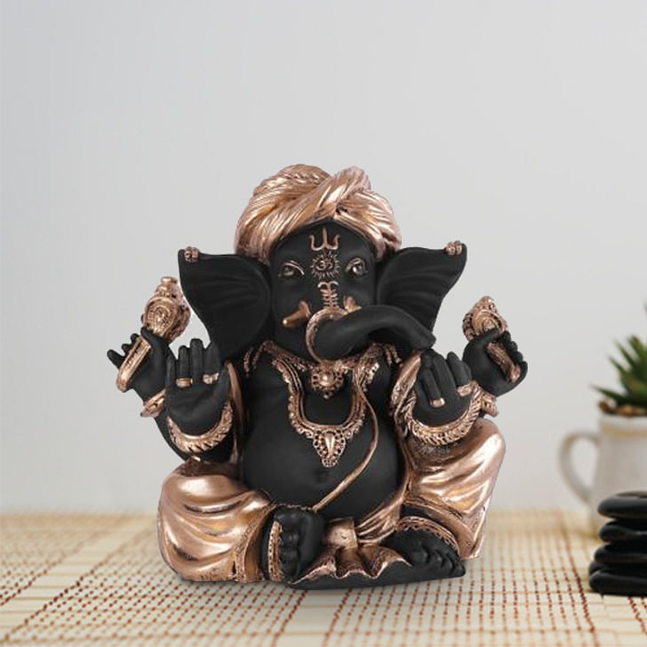 Fio Polyresin Sitting Ganesha Figurine in Black-Gold Colour
